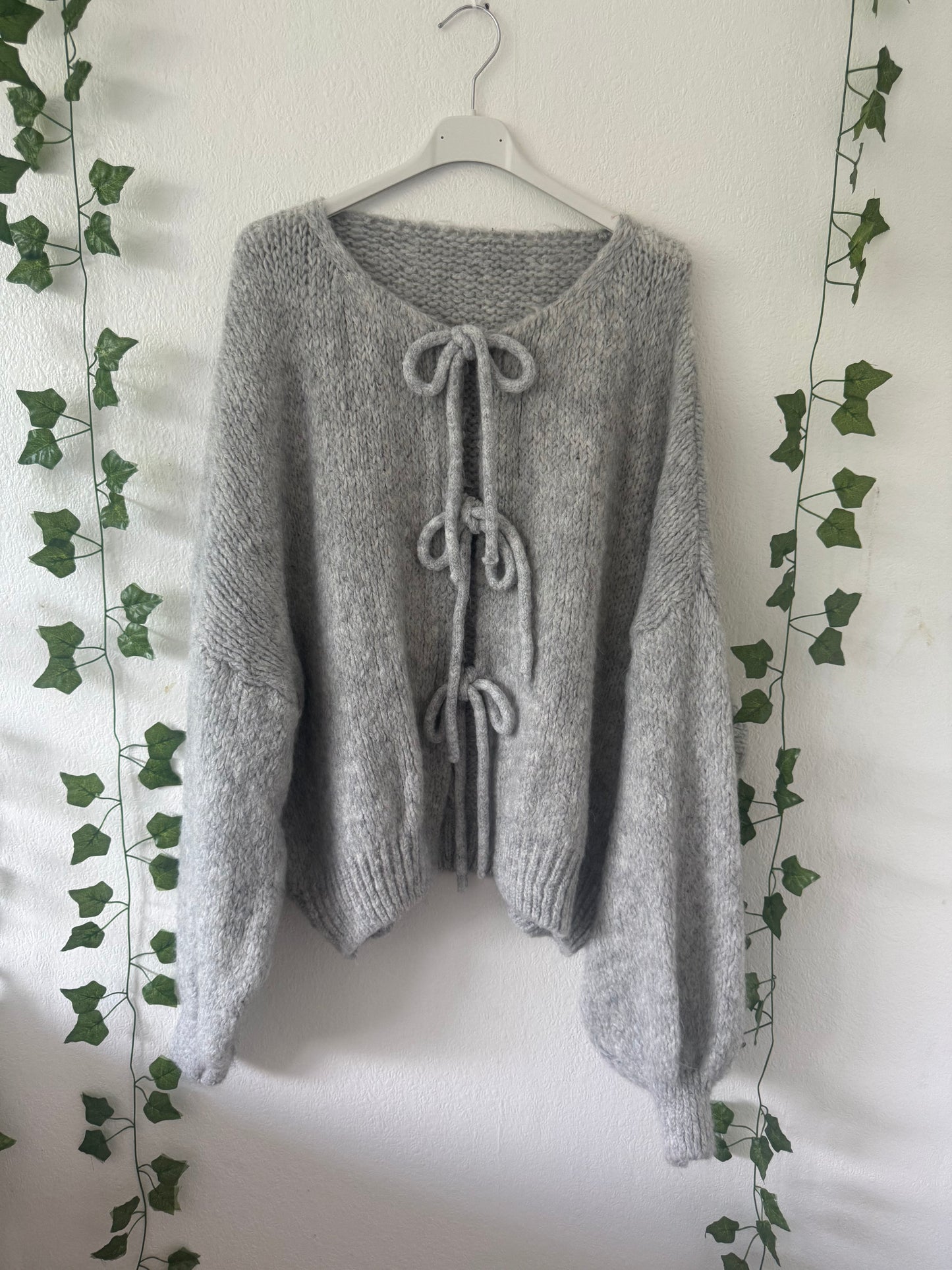 Schleifen Strickjacke